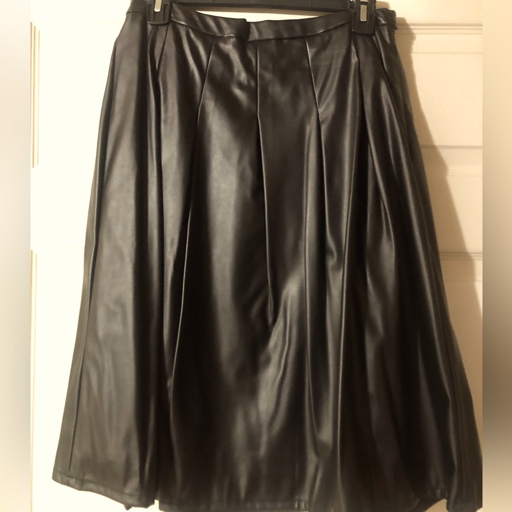 Black faux leather skirt; nice and soft with side zipper; hook and eye closure